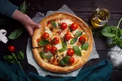 pizza-with-tomatoes-mushroom-and-basil-2026-01-06-11-00-35-utc