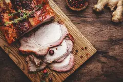 baked-pork-loin-on-rustic-wooden-cutting-board-wit-2026-01-07-07-25-14-utc